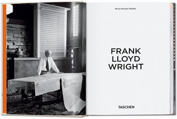 A black and white photo shows Frank Lloyd Wright at a table with architectural drawings. Opposite is the TASCHEN Frank Lloyd Wright book by Bruce Brooks Pfeiffer, celebrating his architecture. Brand: TASCHEN.