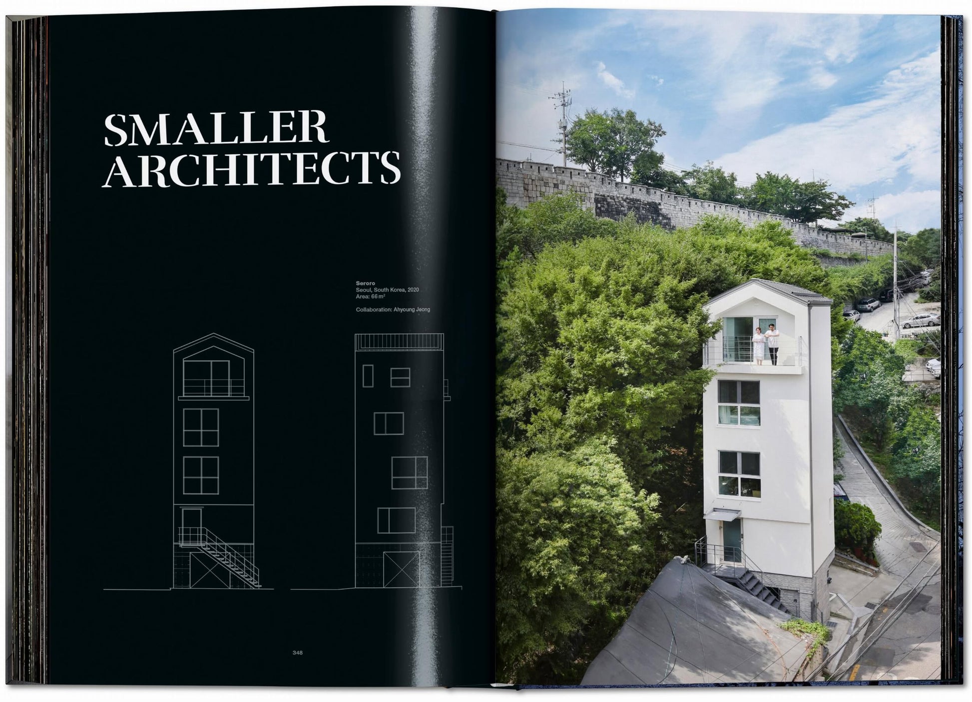 An open TASCHEN Homes for Our Time: Small Houses (XL) book shows text on the left and a photo of a slim, modern white house—highlighting petite architecture and sustainable living—surrounded by greenery and urban scenery on the right.