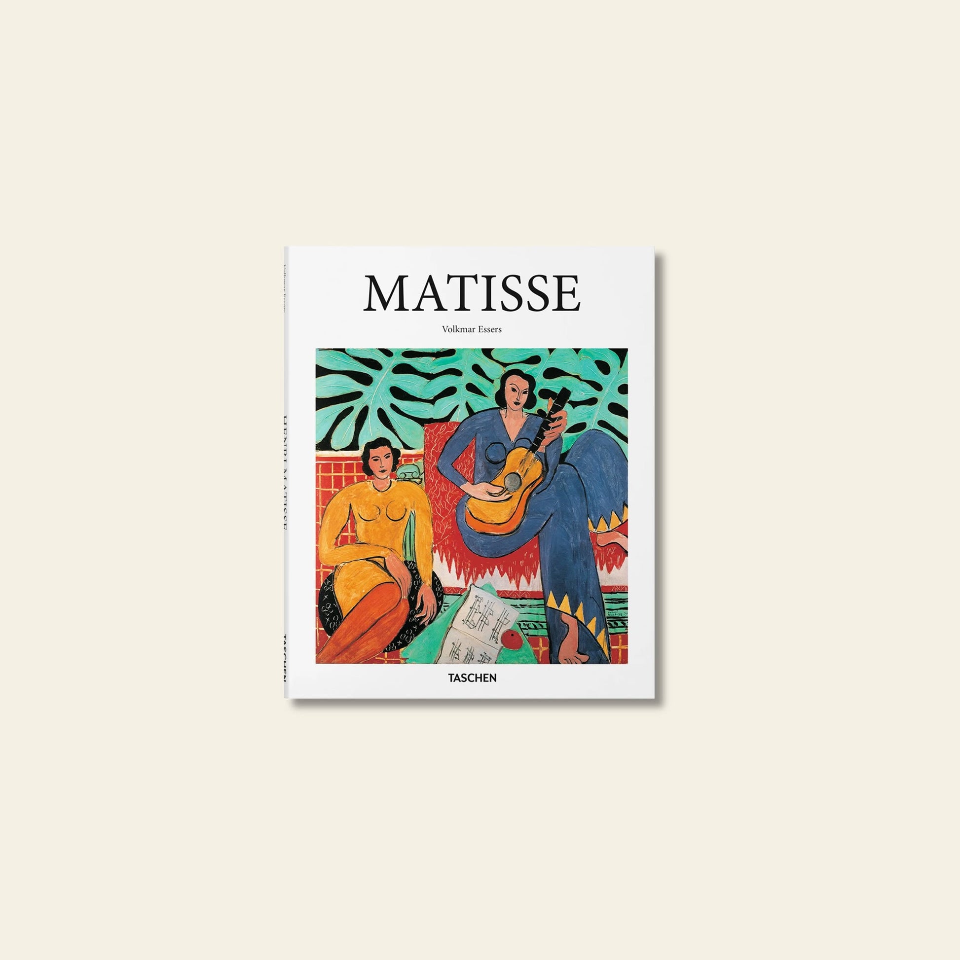 The TASCHEN Matisse book cover features vibrant Fauvist art by Henri Matisse, with two women—one in yellow, one in blue—guitar, and leafy patterns. Published by TASCHEN.