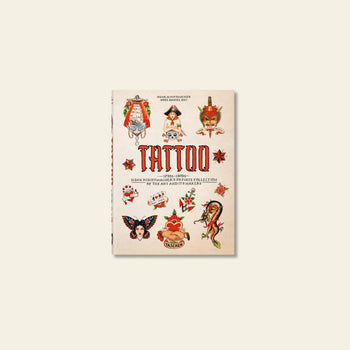 TASCHEN TATTOO 1730s-1970s. Henk Schiffmacher’s Private Collection by TASCHEN features classic tattoo designs (rose, snake, heart, pin-up girl) on a cream cover and explores tattoo history and art from the 1730s–1970s worldwide.
