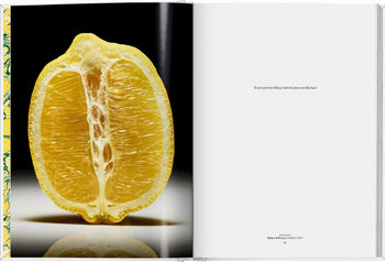 An open TASCHEN The Gourmands Lemon: A Collection of Stories and Recipes displays a photo of halved lemons on the left—a tribute to culinary experts—while the right page features a dedication to Mikey, Gabriel, Jamie, and Michael.