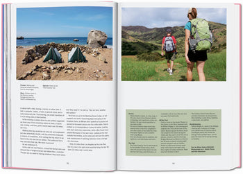 An open TASCHEN The New York Times Explorer: 100 Dream Trips Around the World shows a rocky beach with tents (left) and hikers on a grassy hill (right), inviting discovery. Text covers the lower half of both pages. Brand: TASCHEN.