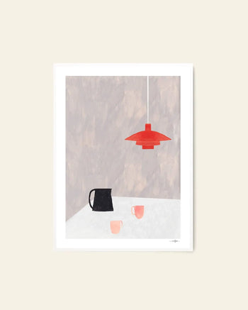 The Poster Club Ana Frois - Orange Pendant (50x70) is a minimalist giclée print featuring a black pitcher, two pink cups on a white table, and an orange pendant lamp against a beige-gray background. Archival quality.