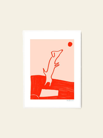 The Poster Club Cinzia Franceschini - Divertissement (50x70) features a minimalist red-outlined dog leaping for a ball on pale pink, inspired by Cinzia Franceschini. This fine art giclée print is beautifully framed on light beige premium art paper.