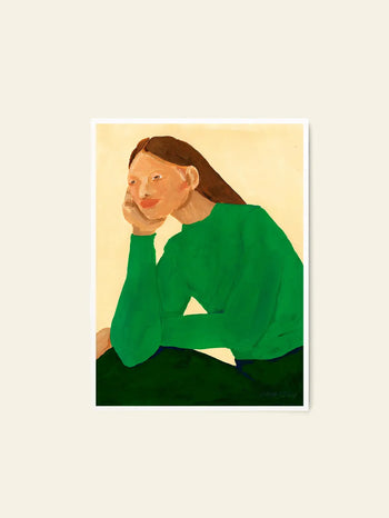 A fine art giclée print, Green Guise (50x70) by Hanna Peterson for The Poster Club, features a person with long brown hair in a bright green top resting their chin on their hand against a cream background.