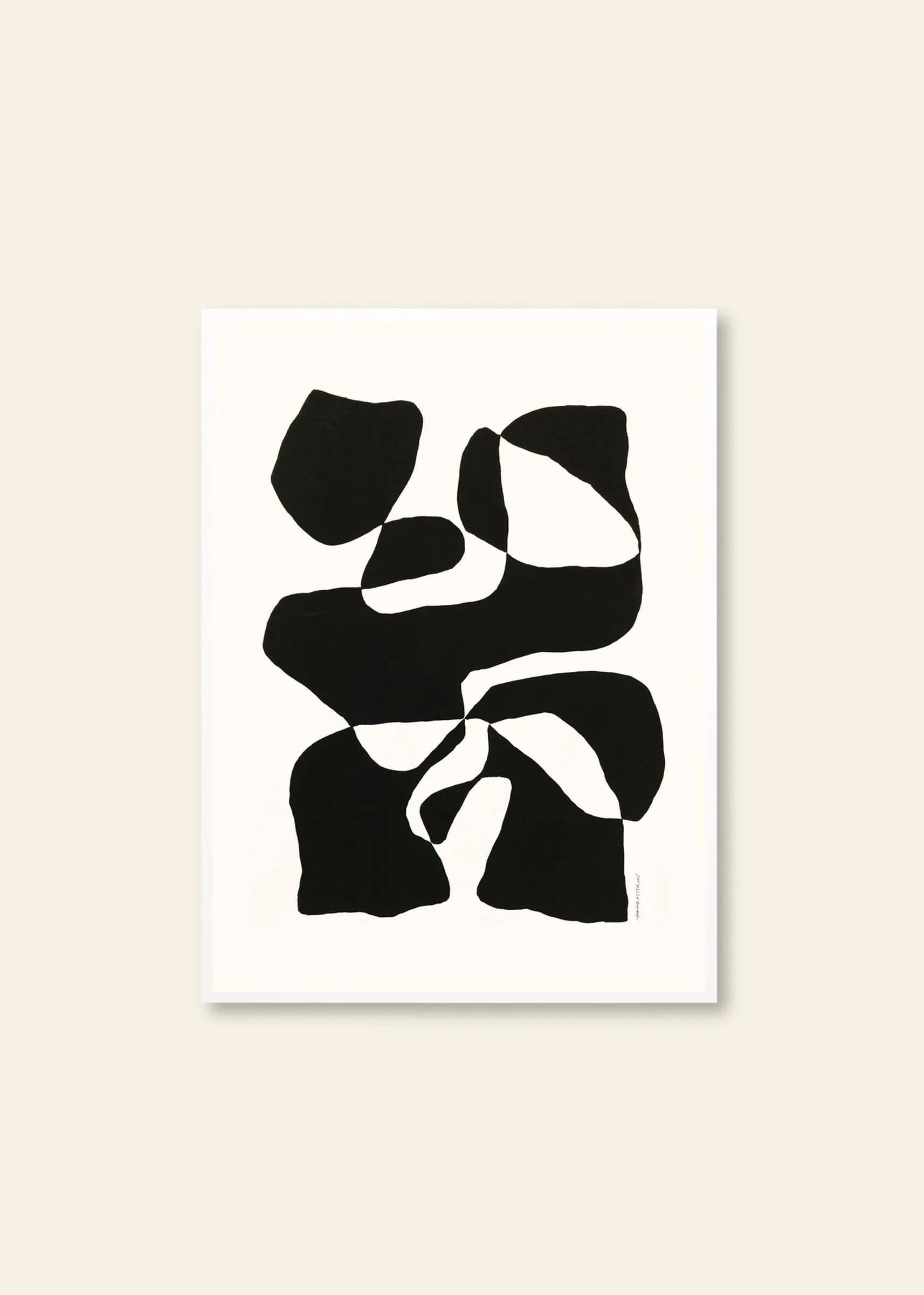 Abstract black shapes with irregular edges are scattered on a white canvas in Hanna Peterson - Impossible Island (30x40), a striking giclée print by The Poster Club, set against a light beige background.