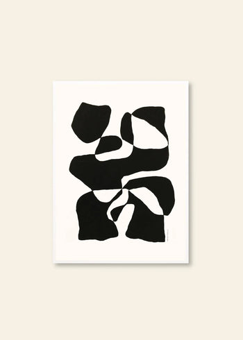 Abstract black shapes with irregular edges are scattered on a white canvas in Hanna Peterson - Impossible Island (30x40), a striking giclée print by The Poster Club, set against a light beige background.