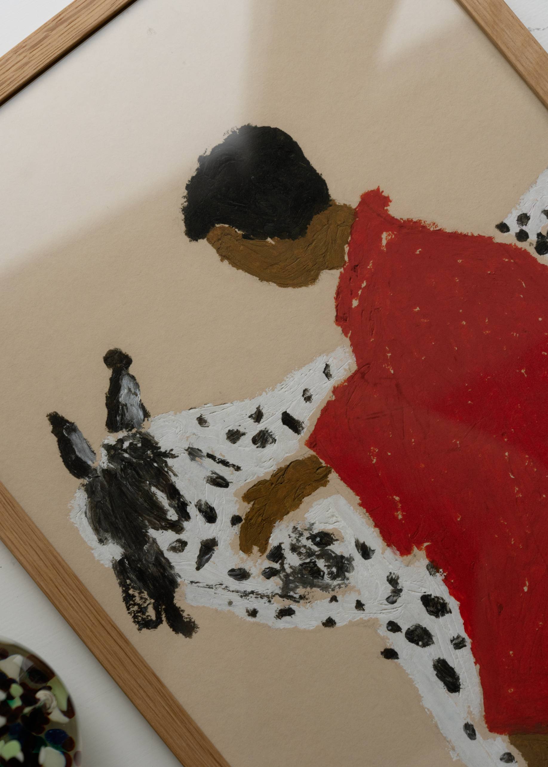 The Poster Club’s Isabelle Vandeplassche - Spotted Horse (30x40) is a boldly styled, archival giclée print showing a figure in red beside a white horse with black spots.