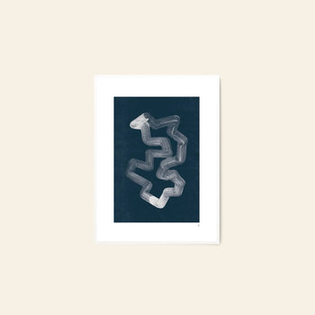 The Poster Club’s Jaguar 01 by Anastasia Krasilnikova (50x70) features a wavy white zigzag on dark blue, shown framed against a light beige wall. Available from The Poster Club.