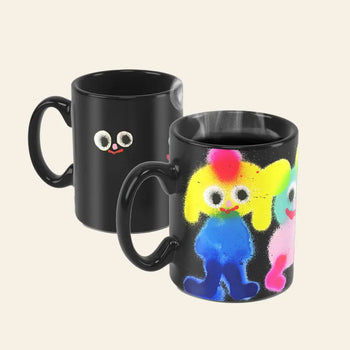 The Third Drawer Down Jon Burgerman Fuzzy Friend Mug features playful, colorful designs with faces and cartoon characters. A fun addition to your collection from the iconic brand Third Drawer Down.