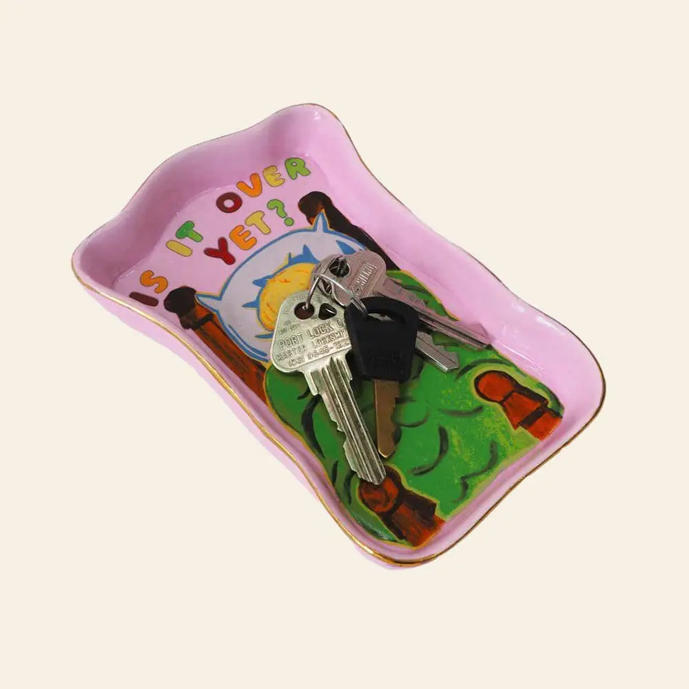 The Third Drawer Down Magda Archer - Is It Over Yet Trinket Tray is a pink ceramic piece with a colorful design, ideal for holding keys or jewelry.