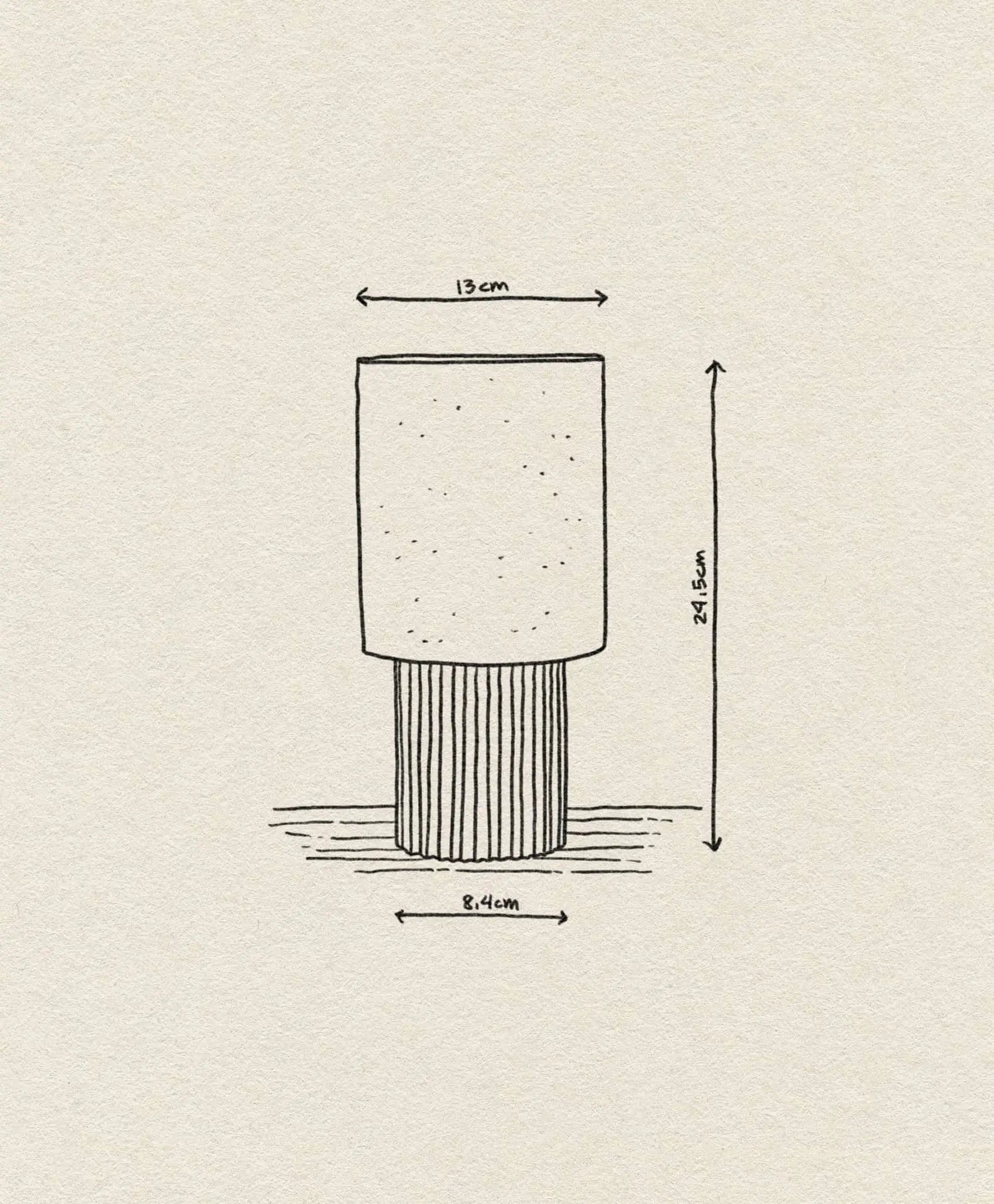 The &Tradition Manhattan SC52 Portable Table Lamp features a hand-drawn, industrial design with a cylindrical form, dotted top, and lined base; it measures 13 cm wide, 24.5 cm tall, with an 8.4 cm wide base.