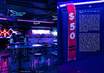 The nightclub scene from UNIT. Volume 2: Golden Mile Complex shows neon lights, empty tables, a bartender at the bar, and a $50 sign on a pole about singer scouting and pay. Brand: UNIT.