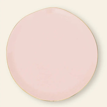 The Urban Nature Culture Good Morning Breakfast Plate is a round, pale pink plate with a thin gold rim and slightly irregular edge, shown against a softly pastel, light background.