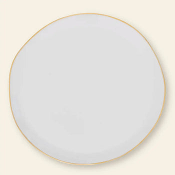 The Urban Nature Culture Good Morning Breakfast Plate is a round, white ceramic plate with a slightly irregular edge and thin gold rim, set against a light beige background with soft pastels.