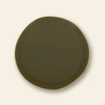 The Urban Nature Culture Good Morning Plate is a round, fir green ceramic plate with an uneven organic rim, from Urban Nature Culture, shown on a light beige background.