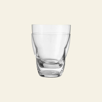 A pair of clear, empty Vipp Vipp240 Glasses 5oz by Vipp—featuring mouth-blown craftsmanship—are stacked together against a plain light beige background.