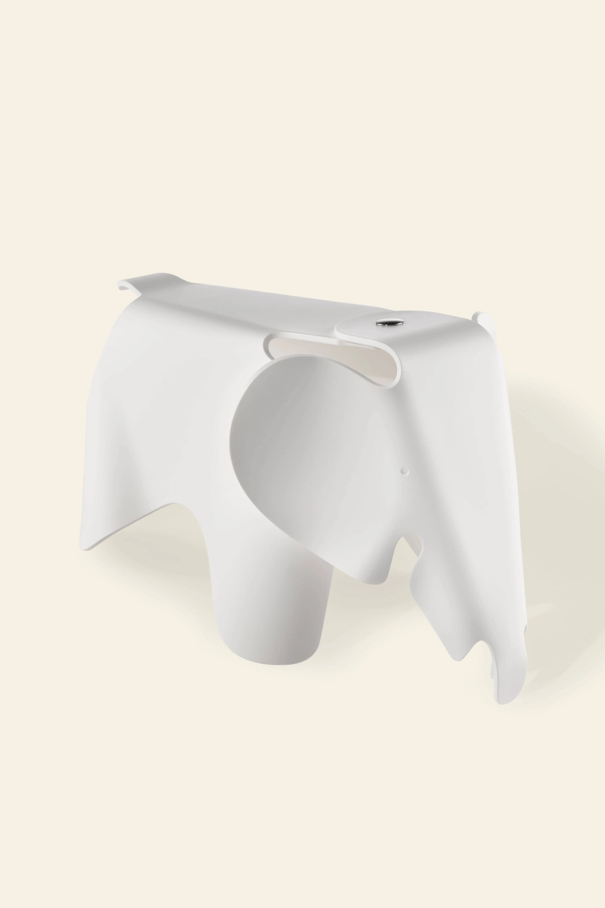 The Vitra Eames Elephant, Small by Vitra features smooth curves, a stylized trunk and ears, and a minimalist white design—making it an iconic decorative accent for any space.