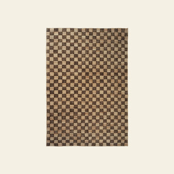 The ferm LIVING Check Wool Jute Rug (200x300) features a timeless rectangular check pattern in brown and beige tones, displayed on a plain off-white background.