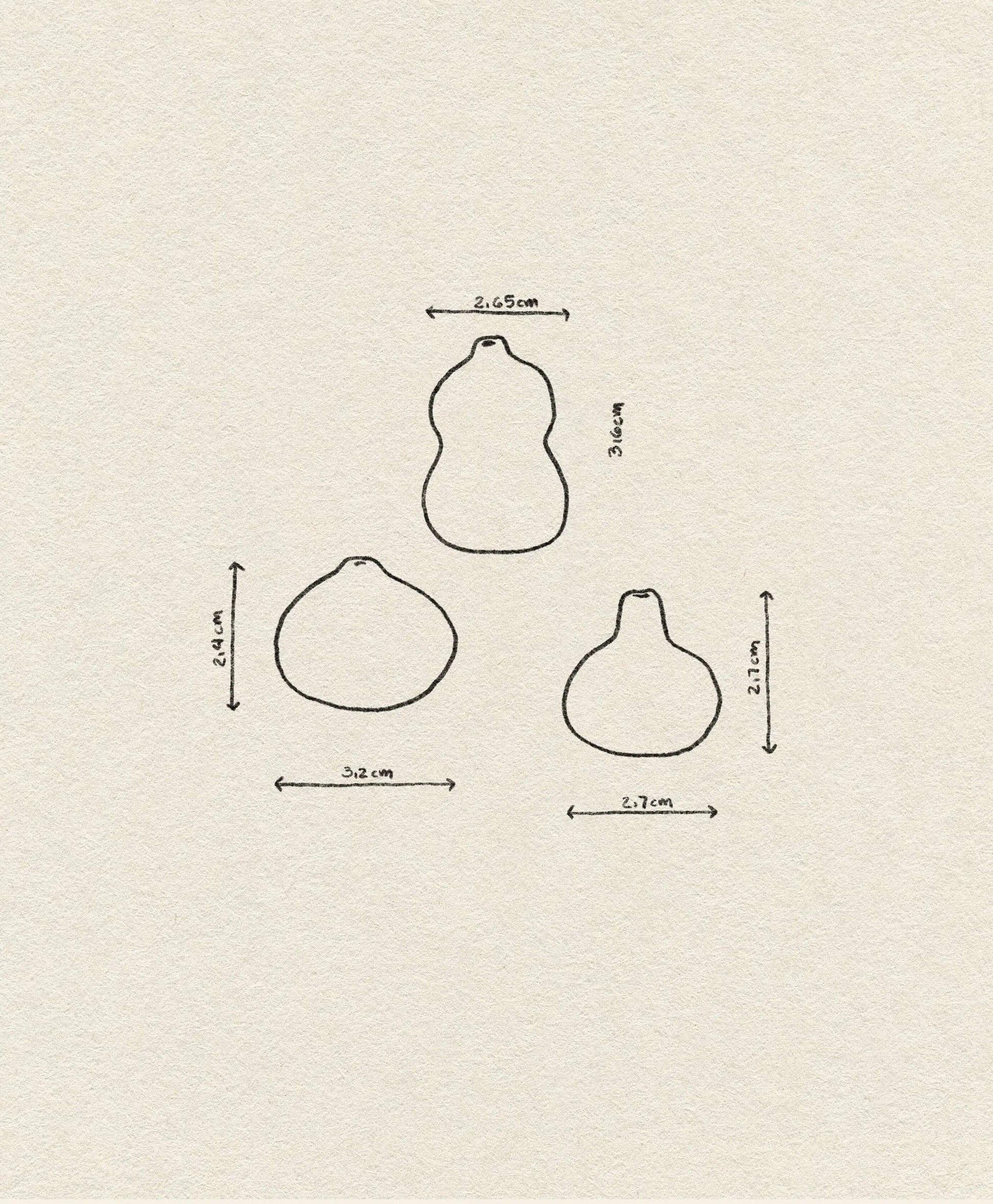 The ferm LIVING Komo Mini Vases, Set of 3, features simple line drawings with marked dimensions—perfect for planning still life arrangements or experimenting with creative glaze techniques.