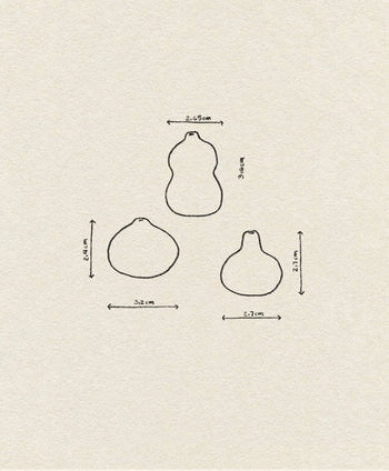 The ferm LIVING Komo Mini Vases, Set of 3, features simple line drawings with marked dimensions—perfect for planning still life arrangements or experimenting with creative glaze techniques.