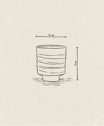 A simple line drawing of the ferm LIVING Serena Cup, a handcrafted clay piece with wavy sides and textured detail, labeled with dimensions: 8 cm wide and 9 cm tall.