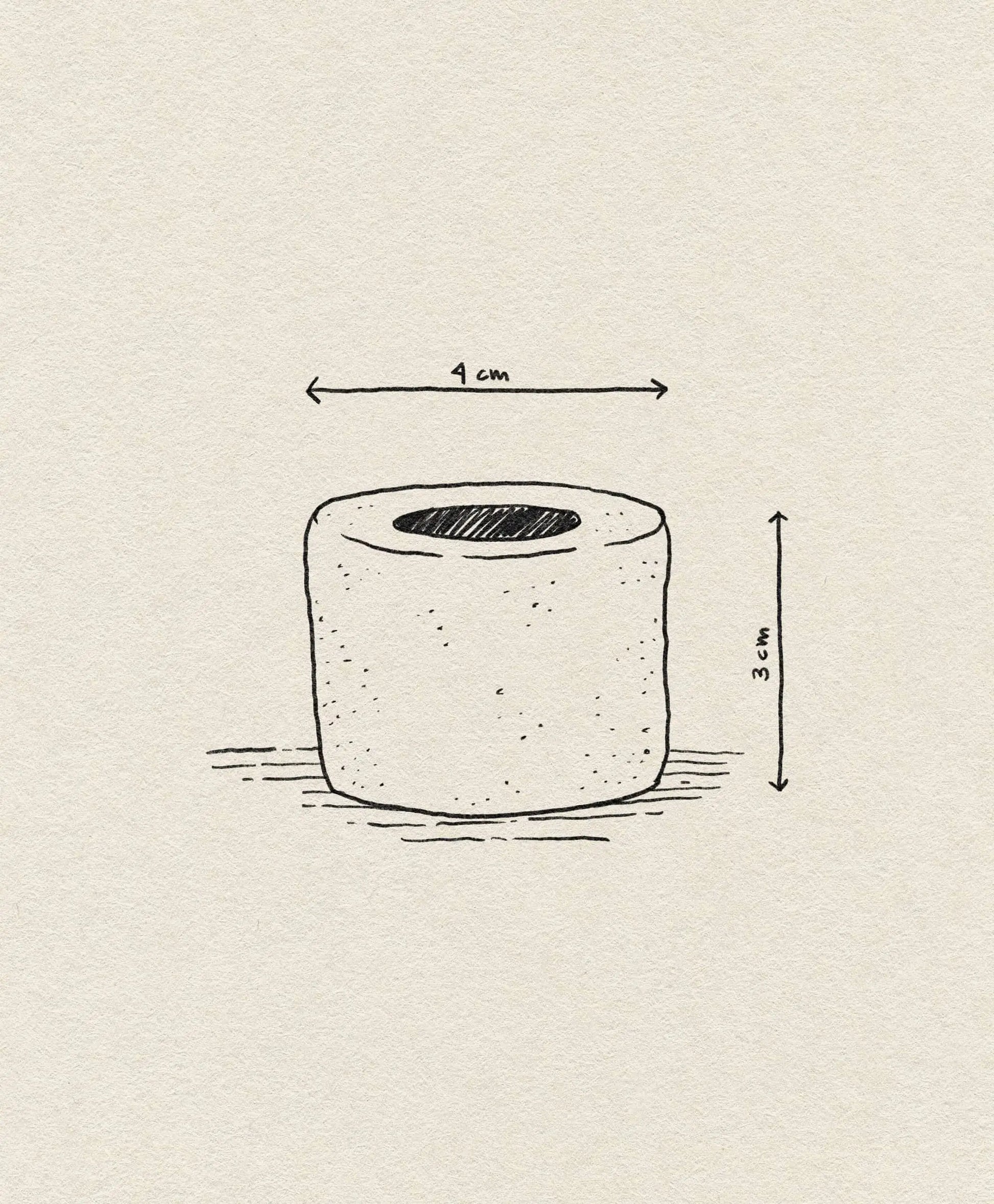 A simple sketch of the ferm LIVING Bon Accessories Toothbrush Holder, a cylindrical bathroom accessory by ferm LIVING, with hand-drawn arrows and labels showing its 4 cm width and 3 cm height—sleek design for modern spaces.