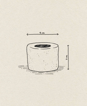 A simple sketch of the ferm LIVING Bon Accessories Toothbrush Holder, a cylindrical bathroom accessory by ferm LIVING, with hand-drawn arrows and labels showing its 4 cm width and 3 cm height—sleek design for modern spaces.