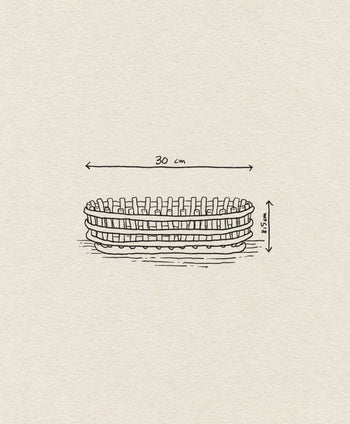 Hand-drawn illustration of the ferm LIVING Ceramic Basket Oval by ferm LIVING, featuring a contemporary design with dimensions labeled (30 cm long, 8.5 cm high) and an off-white background that enhances its modern look.