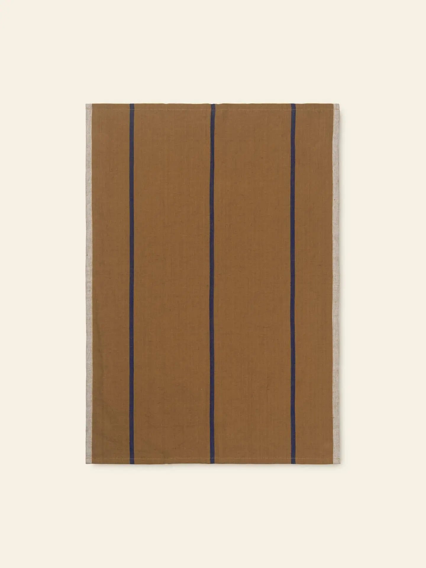The ferm LIVING Hale Tea Towel by ferm LIVING features a rectangular brown cloth with vertical navy blue stripes and light beige side borders, displayed flat on a light beige background.