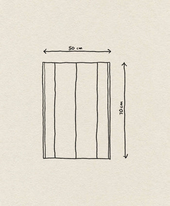 The ferm LIVING Hale Tea Towel by ferm LIVING is shown as a hand-drawn rectangle (50 cm x 70 cm) split into four vertical sections, with labeled arrows marking dimensions on a textured background.
