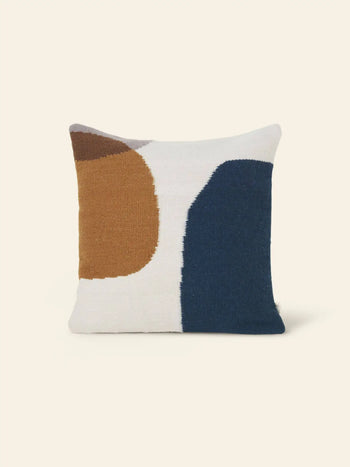 The ferm LIVING Kelim Cushion by ferm LIVING features abstract geometric shapes in mustard yellow, dark blue, brown, and white on cream—ideal for bringing Scandi style and a splash of color to any room.