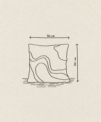 A sketch of the ferm LIVING Vista Cushion—50x50 cm, featuring abstract wavy lines—appears on textured off-white paper with labels and double-headed arrows, capturing luxurious modern style for your home.