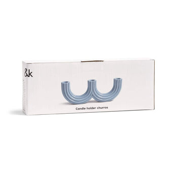 A rectangular white box displays an image of the &klevering Churros Candle Holder Light Blue, a unique handcrafted piece by &klevering—ideal for adding distinctive style to your home décor.