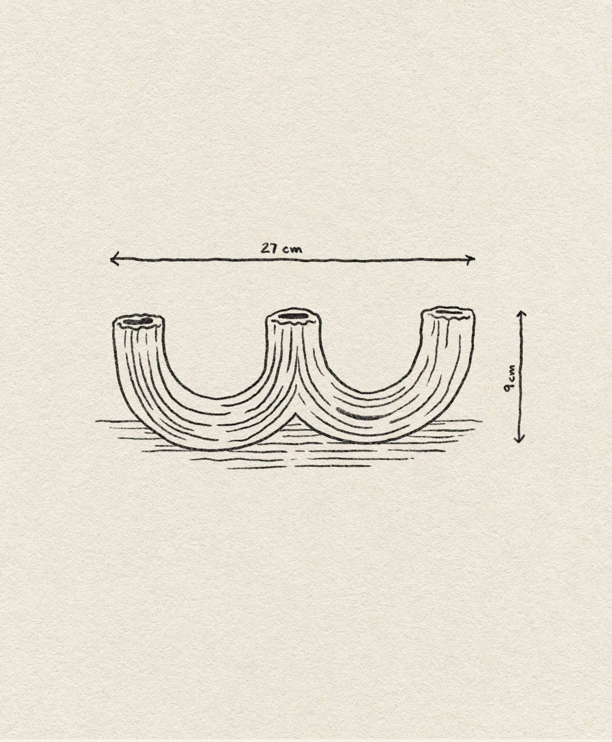 A simple line drawing of the &klevering Churros Candle Holder Light Blue, 27 cm wide and 9 cm tall, appears on a textured beige background. Arrows indicate its dimensions, highlighting this unique &klevering home decor piece.