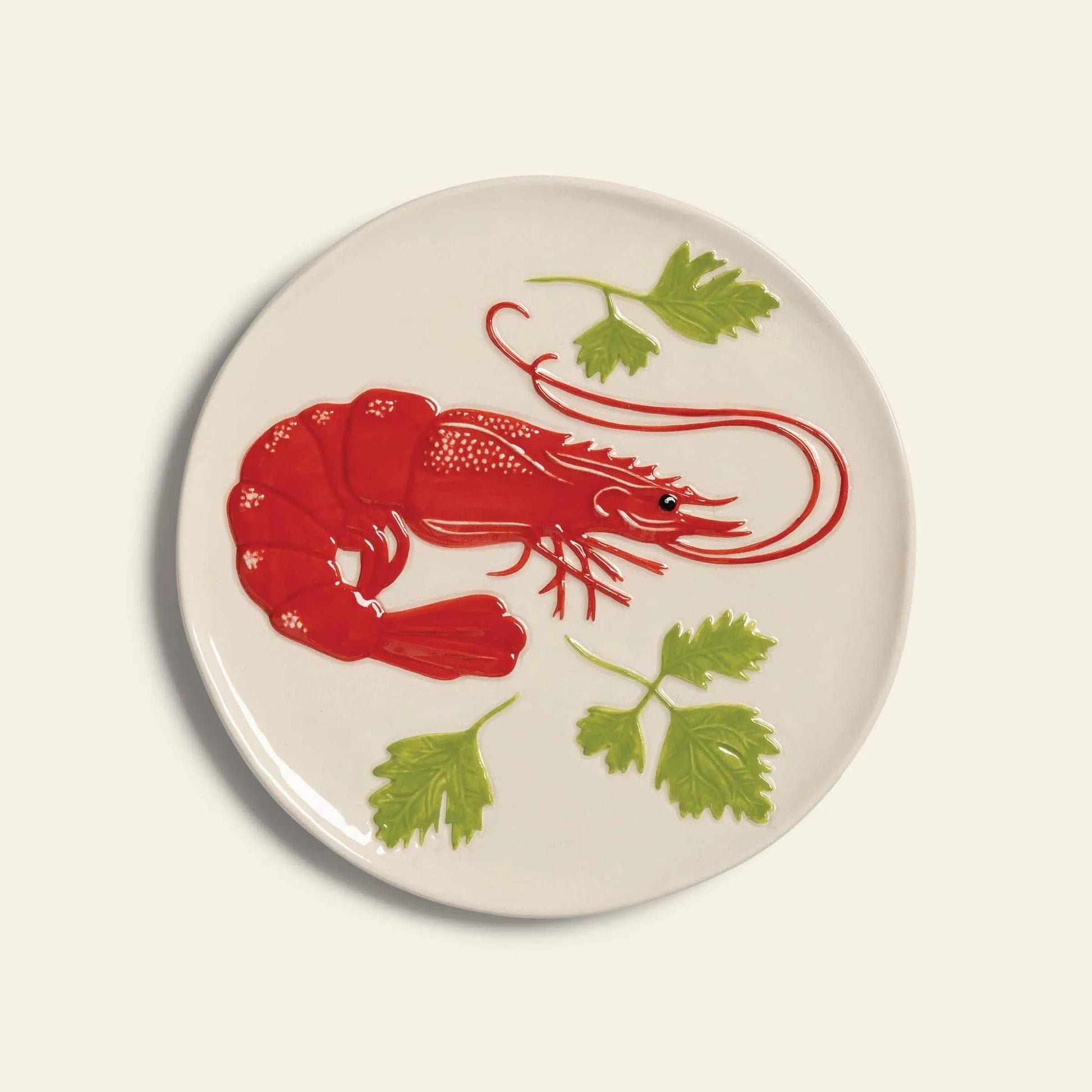 The &klevering De La Mer Plate, Set of 4 by &klevering features white plates decorated with a red shrimp and green herbs, offering an oceanic charm to your tableware collection.