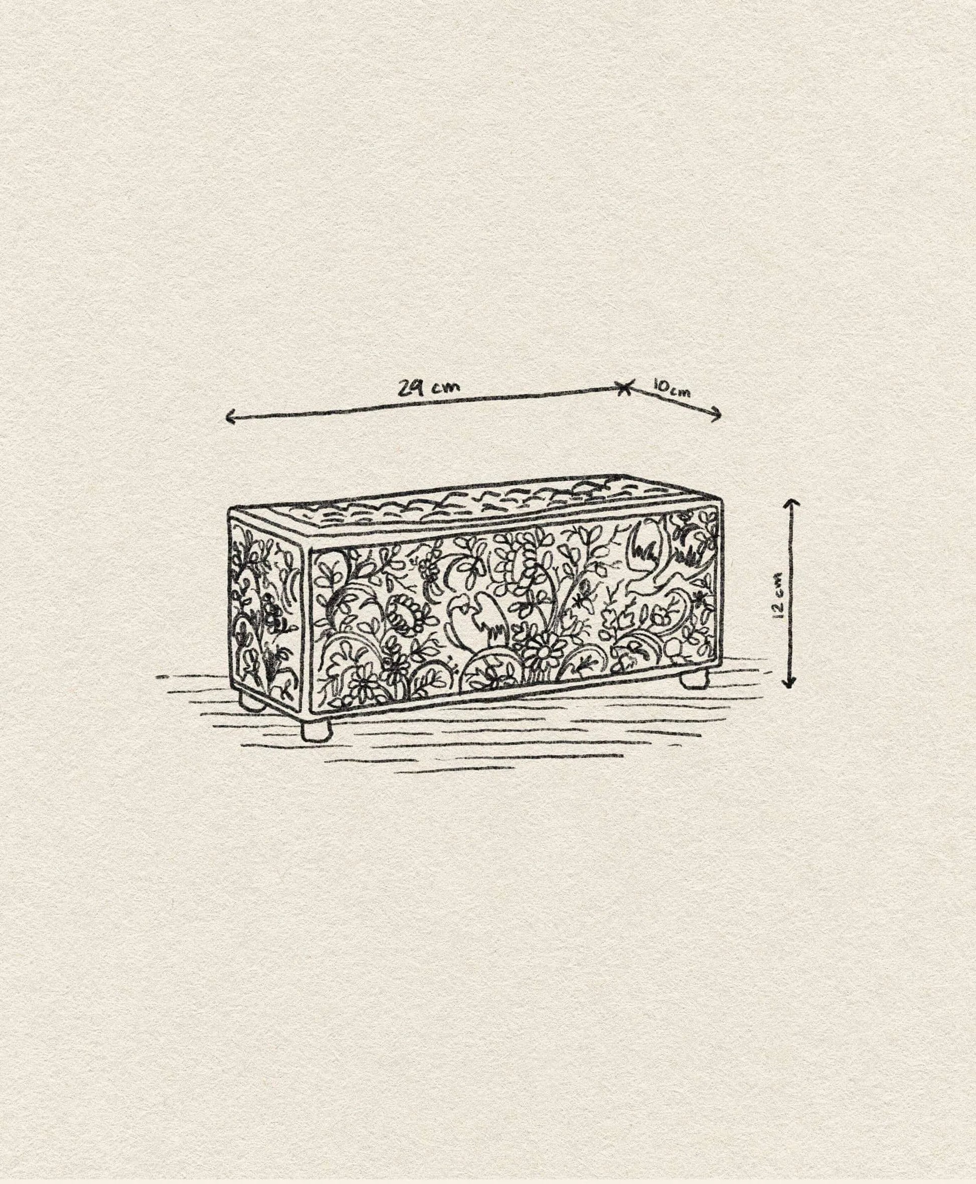 A sketch of the &klevering Flowerbrick Vase, a rectangular decorative box by &klevering, featuring floral and animal patterns (29 x 10 x 12 cm), evokes hand-painted porcelain against a textured background.