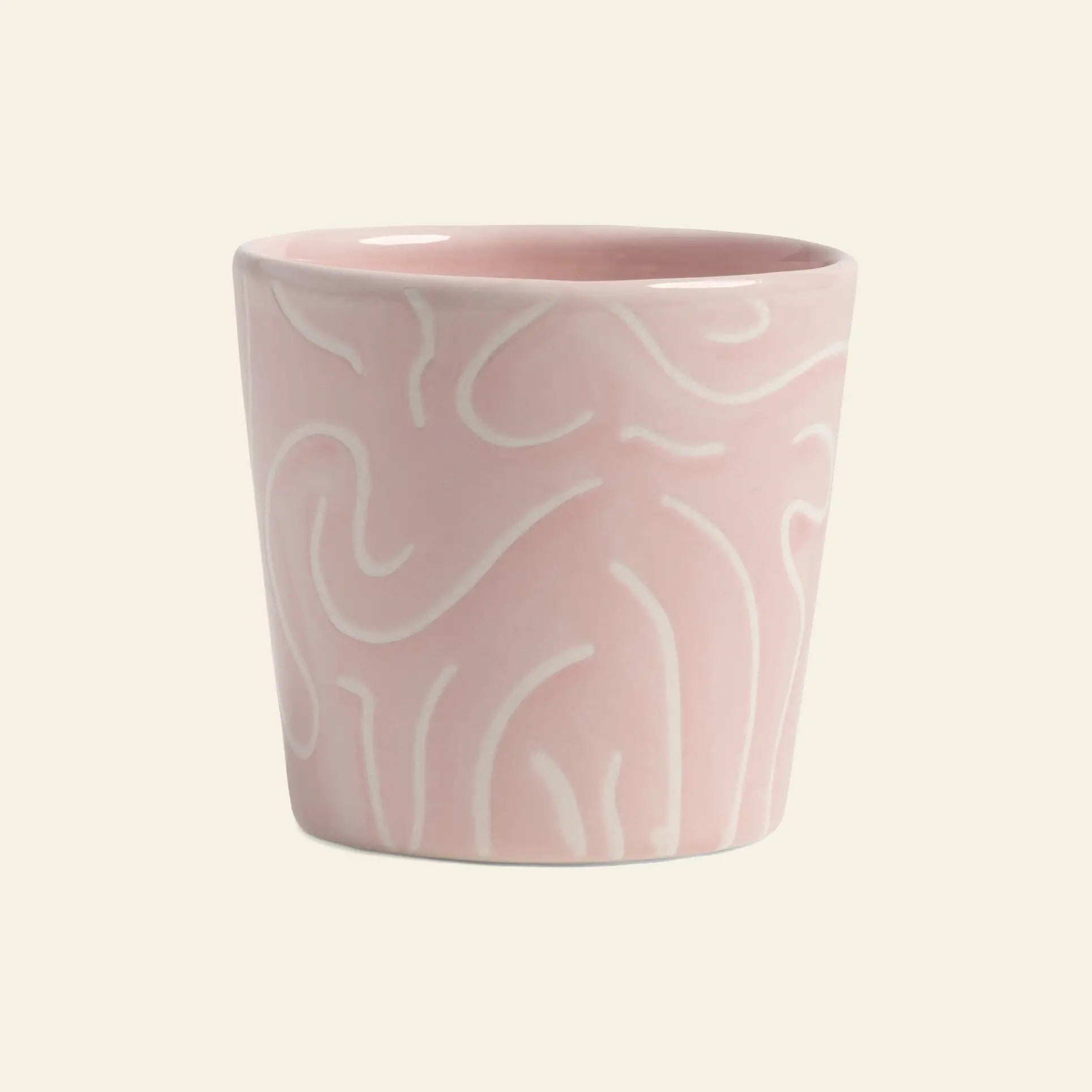 The &klevering Soba Mug Small, Set of 4, features light pink mugs with cheerful white wavy doodle prints on an off-white background.