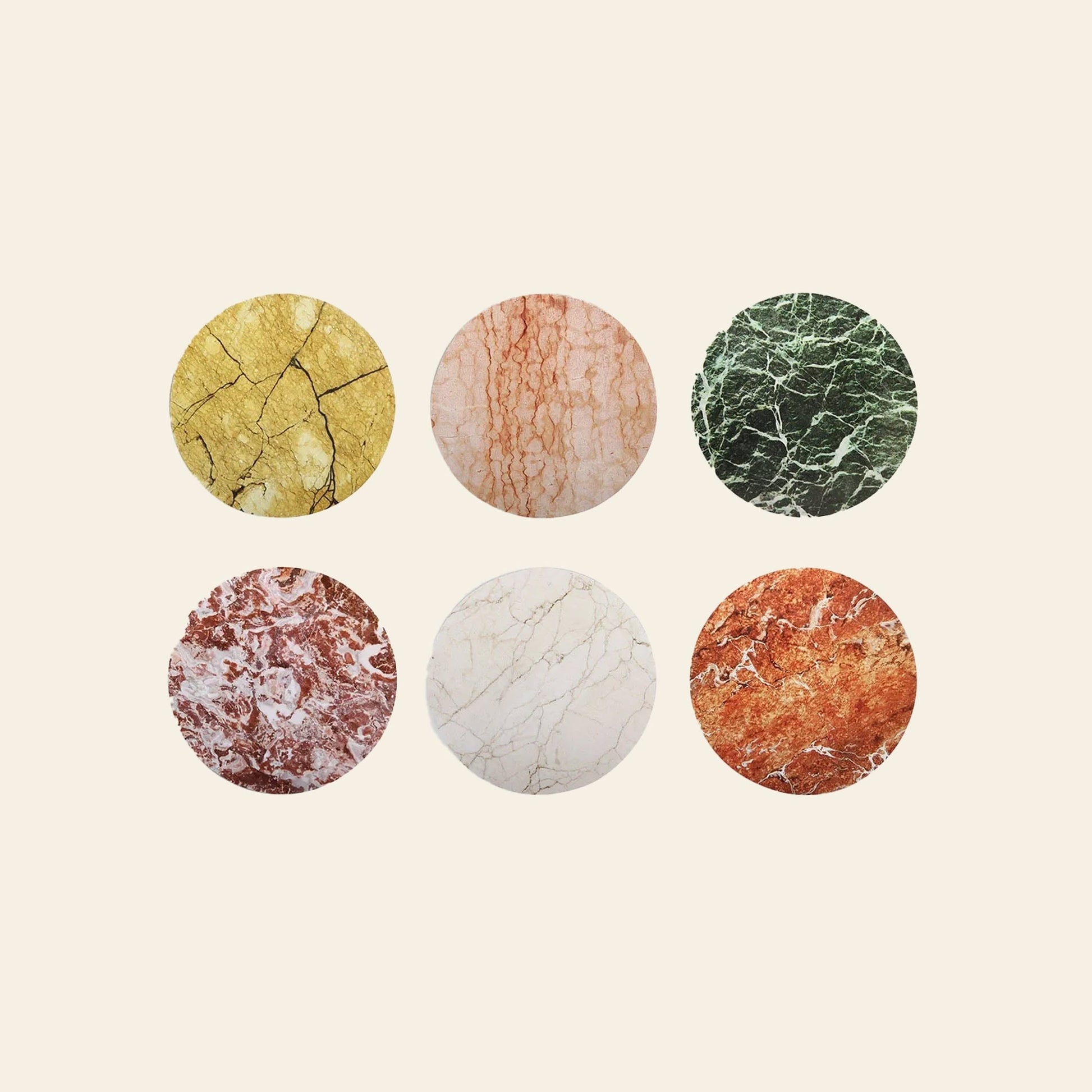 The &klevering Stone Coaster Set features six uniquely designed coasters in yellow, pink, green, red, white, and orange marble patterns, arranged in two rows on a light beige background.
