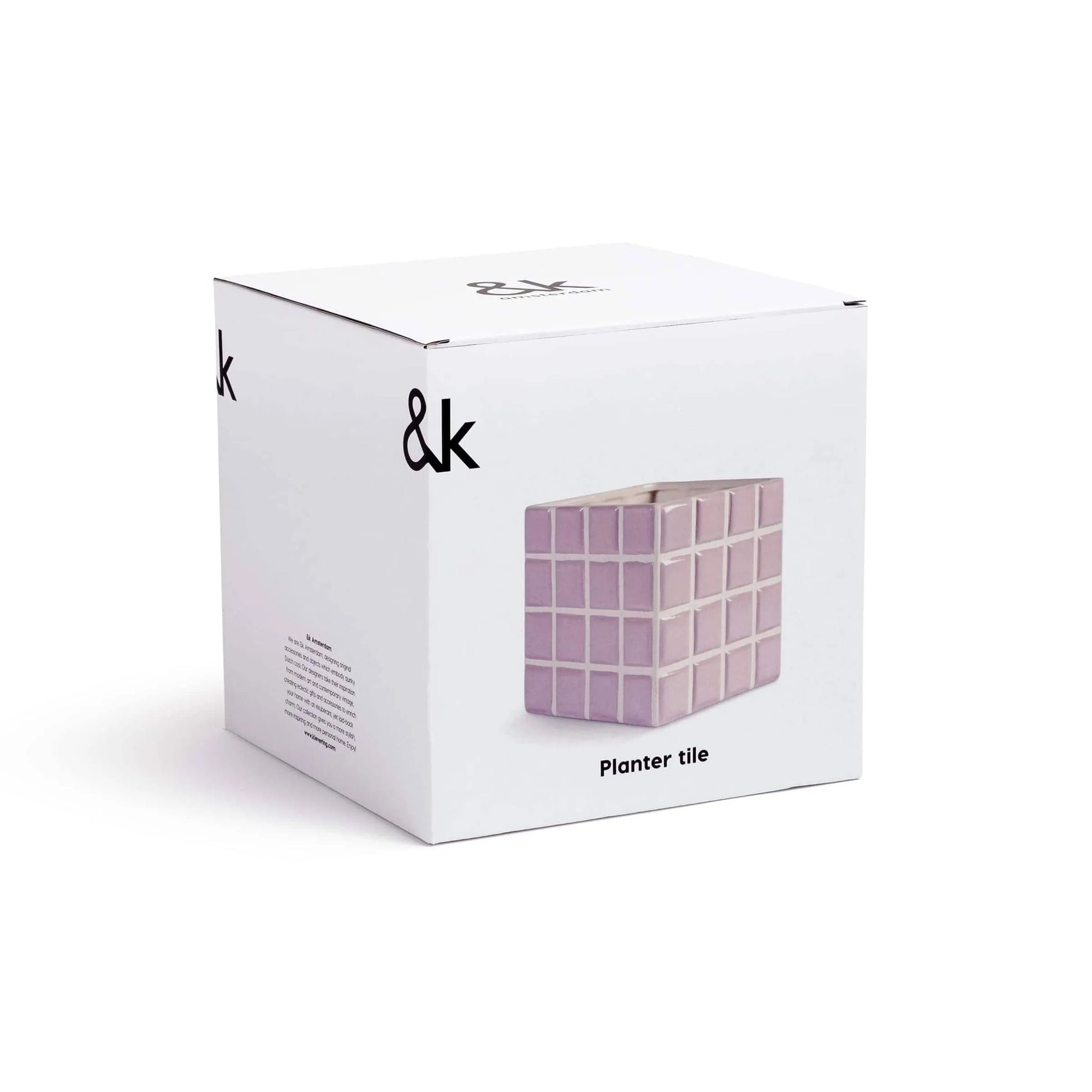 A white box with minimalist design displays a photo of the &klevering Tiled Planter Lilac—featuring a lilac candy-coloured tile pattern and “&k” logo—perfect for showcasing your botanical treasures.