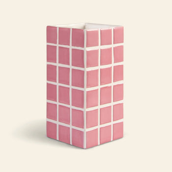 The &klevering Tiled Vase Pink by &klevering is a rectangular ceramic vase with a glossy candy-coloured pink and white tile pattern, featuring clean lines and set against a plain off-white background.