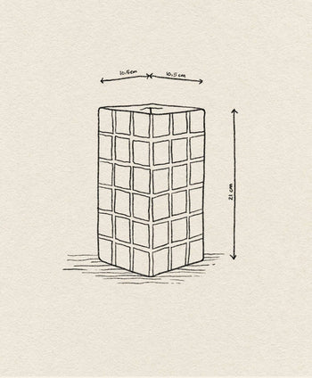 Line drawing of the &klevering Tiled Vase Pink by &klevering, featuring a rectangular block with a candy-coloured tile pattern; measures 21 cm tall and 10.5 cm wide/deep, shown on textured paper with arrows indicating dimensions.