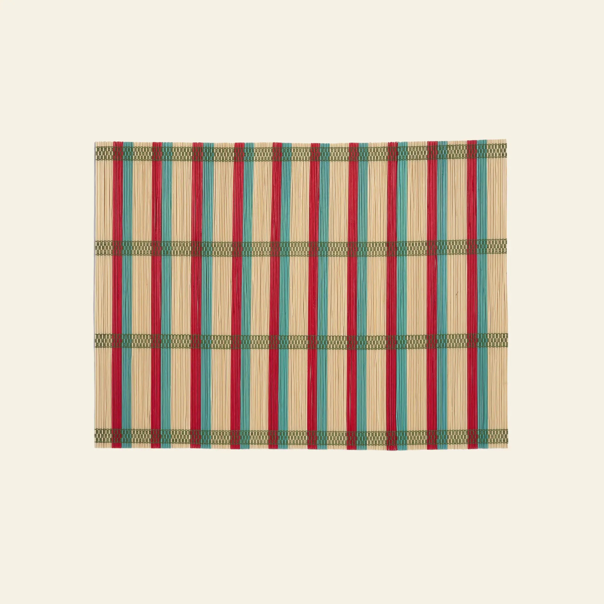 The &klevering Umami Placemat, Set of 4, features rectangular bamboo mats with green, red, blue, and beige stripes—ideal for adding vibrant style to your dining table.