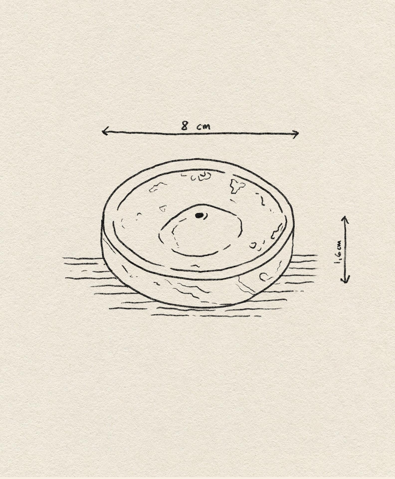 A hand-drawn sketch of the stillgoods Ebb Incense Holder, a round bowl (8 cm diameter, 1.6 cm height), ideal as an accessory tray or incense holder, displayed with measurement arrows on a textured background.