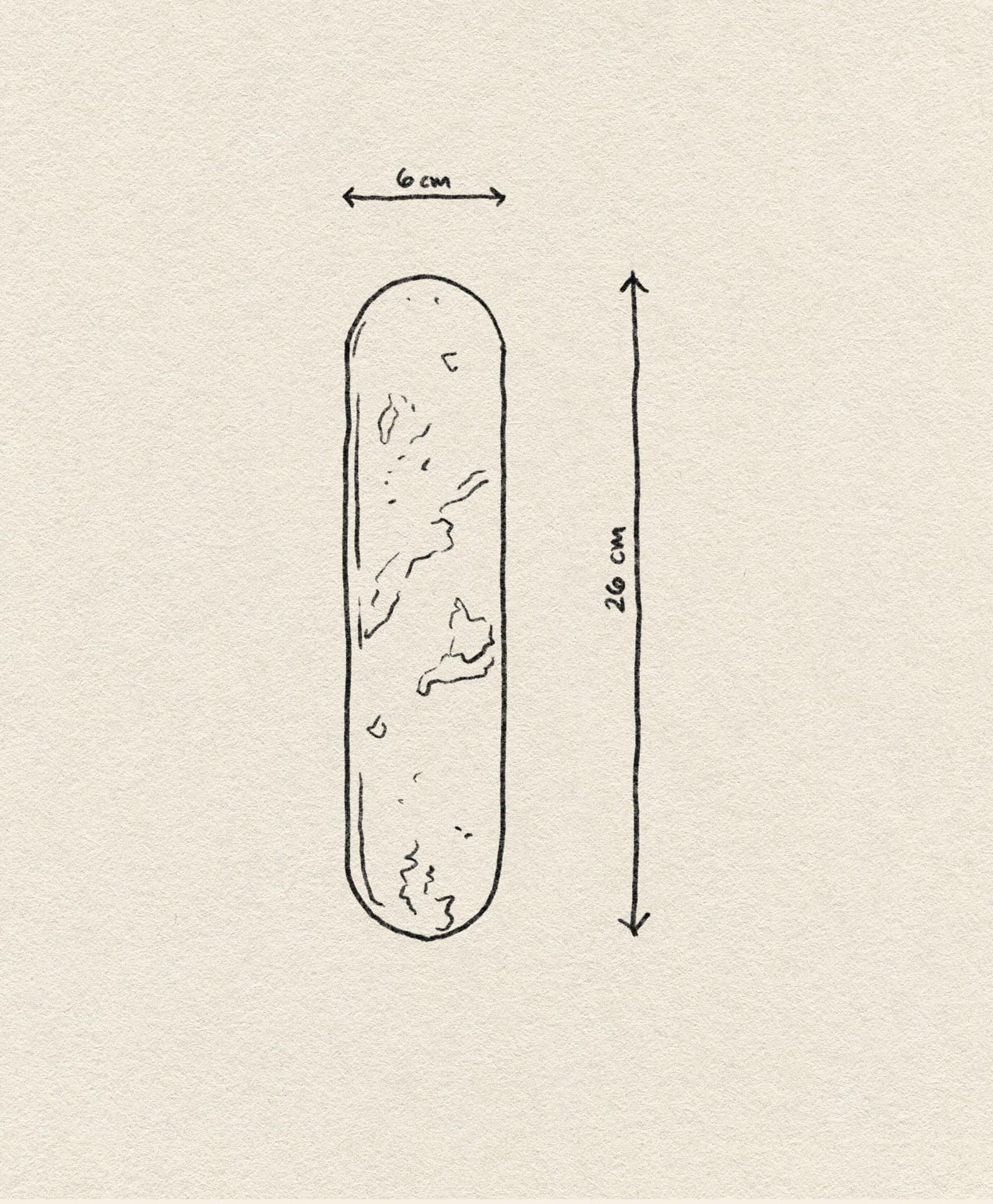 A minimalist line drawing of the stillgoods Horizon Incense Holder (26 cm × 6 cm) by stillgoods, featuring an elongated textured design on a beige background with arrows showing dimensions.