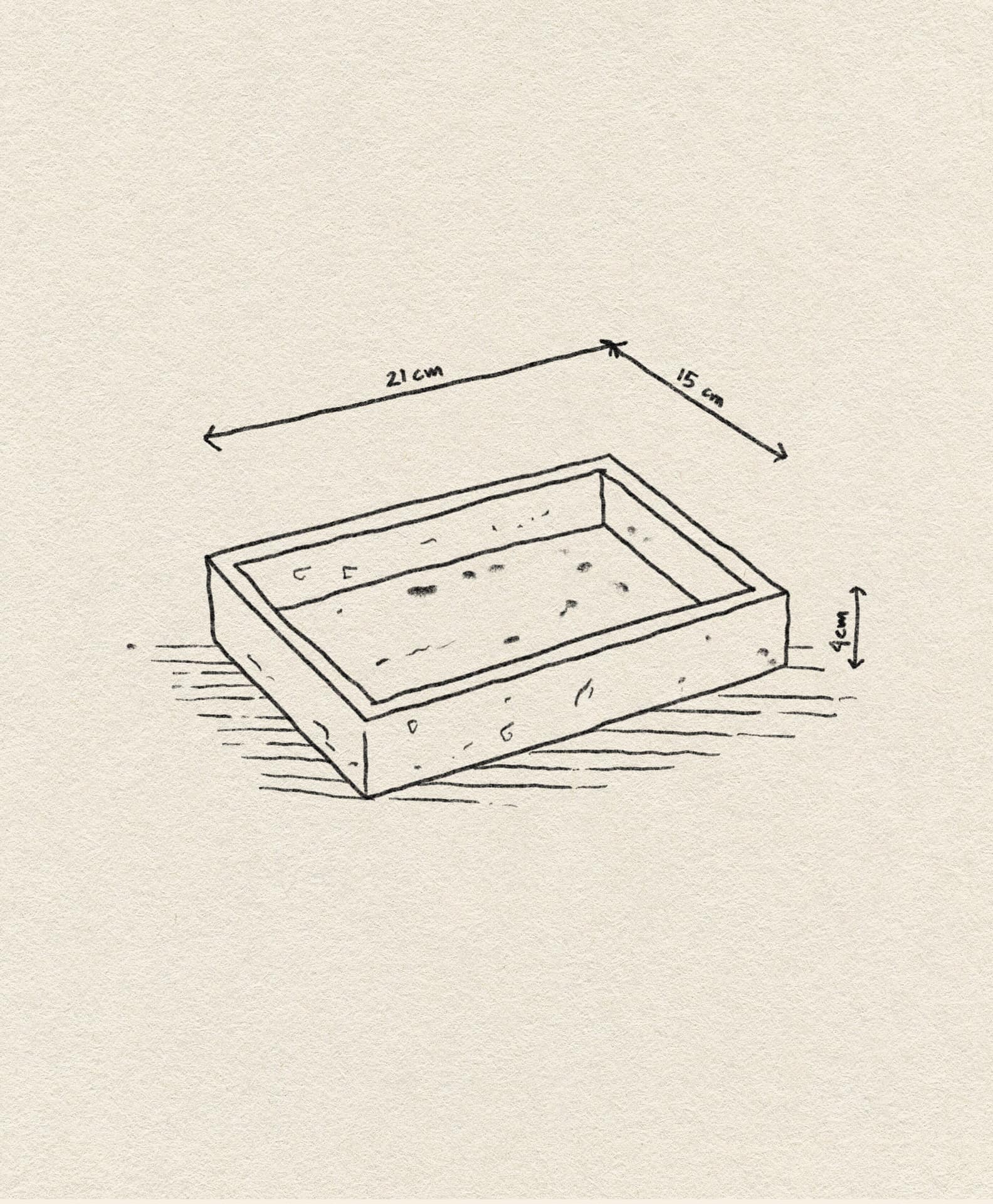 A hand-drawn sketch of the stillgoods Mini Valor Tray, a rectangular wooden tray by stillgoods with low height. Dimensions: 21cm (L) x 15cm (W) x 4cm (H). Set against a parchment-like textured background.